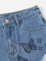 SHEIN Teen Girls Butterfly Print Ripped Raw Cut Denim Shorts