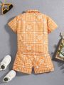 SHEIN Kids Cooltwn Toddler Boys' Loose Fit Paisley Print Short Sleeve Shirt And Shorts Set