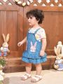 SHEIN Baby Girl's Cute Denim Style Ruffle Hem Overall Skirt With Cartoon Pattern Short Sleeve Top Outfit