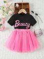 SHEIN Kids FANZEY Toddler Girls' Letter Printed Short Sleeve T-Shirt And Tutu Net Yarn Half Skirt Set