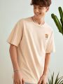 Manfinity VCAY Loose Fit Men's Knitted Short Sleeve Casual T-Shirt With Seaside Print On The Back