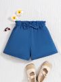 SHEIN Kids CHARMNG Tween Girls' Fashionable Casual Denim Shorts With Paper Bag Waist And Bow Decoration