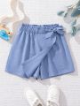 SHEIN Kids EVRYDAY Girls' Woven Solid Color Loose Fit Casual Mini Skirt Shorts