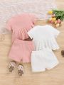 SHEIN Infant Girls' Casual Knitted Pure Color Short Sleeve Top And Elastic Waist Shorts Set (4pcs)