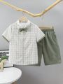 SHEIN Kids FANZEY 2pcs/Set Tween Boys' Grid Pattern Short Sleeve Dress Shirt With Bow Tie, And Shorts Gentleman Outfits