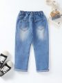 Young Girl Ripped Frayed Cut Out Ripped Frayed Straight Leg Jeans