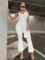 SHEIN SXY Cut Out Crisscross Back Flare Leg Jumpsuit