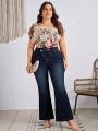 SHEIN LUNE Plus Size Water Wash Flared Jeans With Staggered Waist