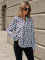 SHEIN Clasi All-Over Printed Notched Neck Long Sleeve Blouse