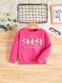 Young Girl Cartoon & Letter Graphic Pullover