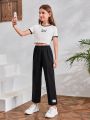 SHEIN Kids Cooltwn Girls Letter Patched Detail Press Crease Elastic Waist Pants