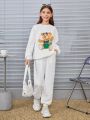 SHEIN Kids EVRYDAY Teenage Girls' Knitted Solid Floral Round Neck Oversized Casual Sweatshirt And Knitted Loose Elastic Waistband Jogger Pants 2pcs/set