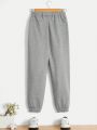 SHEIN Boys' Casual, Comfortable, Loose-Fit Solid Color Sweatpants