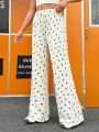 SHEIN Qutie Loose And Cute Footprint Printed Ladies' Pants