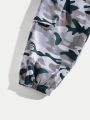 SHEIN Kids HYPEME Tween Boys' Stylish Camouflage Print Joggers With Pockets And Drawstring Waist, Loose Fit