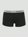 Men 4pcs Letter Graphic Tape Waist Boxer Brief