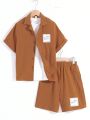 SHEIN Kids SUNSHNE Boys' Casual Solid Color Shorts & Woven Short-Sleeved Top Two-Piece Set, With Stick Decoration