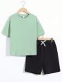 SHEIN Kids SUNSHNE Boys' Scenery & Slogan Printed Short Sleeve T-shirt With Round Neckline And Solid Color Shorts Set