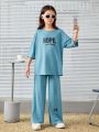 SHEIN Kids Nujoom Teen Girls' Loose Fit Vintage Round Neck T-shirt And Long Pants Set