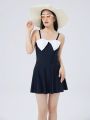 Women's One Piece Swimsuit With Bowknot Decoration And Color Blocking Design