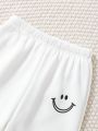 SHEIN Kids Academe Girls' Smiling Face Printed Elastic Waist Sweatpants For Teenagers