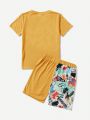 SHEIN Kids EVRYDAY Tween Boys' Graphic Print Short Sleeve T-Shirt And Shorts, Casual And Comfort Outfits