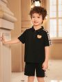 SHEIN Kids Academe Toddler Boys' Cute Bear Applique Plaid Polo Shirt And Shorts Set