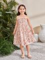 SHEIN Kids SUNSHNE Young Girls' Round Neck Short Sleeve Top With Ruffle Trim And Spaghetti Strap Floral Dress Set