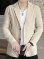 Manfinity Mode Men Lapel Collar Dual Pocket Button Front Blazer