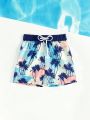 Young Boy Coconut Tree Print Swim Trunks