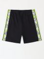 Teenage Boys' Surfing Sports Spliced Printed Letter Swim Trunks