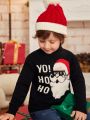 SHEIN Toddler Boys Ugly Christmas Slogan Pattern Turtle Neck Sweater