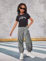 SHEIN Kids Cooltwn Teenage Girls' Sports Streetwear Casual Weave Letter Patterned Elastic Cuff Long Pants