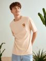 Manfinity VCAY Loose Fit Men's Knitted Short Sleeve Casual T-Shirt With Seaside Print On The Back