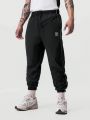 Men Letter Graphic Contrast Piping Drawstring Waist Pants