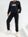 Ladies' 2pcs Letter Pattern Long Sleeve Top And Pants Set