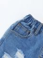 Young Girl Ripped Frayed Cut Out Ripped Frayed Straight Leg Jeans