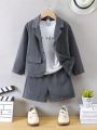 SHEIN Kids FANZEY Young Boy'S Gentleman Dress Set Including Lapel Single Breasted Suit Jacket, Shorts, Letter Printed Short Sleeve T-Shirt