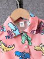 SHEIN Kids QTFun Young Boy'S Cute Dinosaur Digital Print Short Sleeve Shirt And Shorts Set For Summer