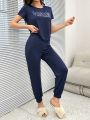 Women'S Short Sleeve Top & Long Pants Sleepwear Set With Slogan Print
