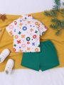 SHEIN Baby Boy Cute Symbol Pattern Short Sleeve Shirt Solid Color Shorts Set