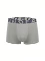 Men 4pcs Letter Graphic Tape Waist Boxer Brief