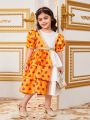 SHEIN Kids Nujoom Young Girls' Flower Printed Patchwork Layered Bubble Sleeves Dress With Round Neck