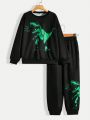 SHEIN Boys' Casual Dinosaur Cartoon Printed Round Neck Sweater And Solid Color Pants Knitted Two-piece Suit, Spring/autumn