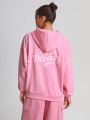 XYZ Studio Letter Printed Drop Shoulder Kangaroo Pocket Hoodie Sweatshirt