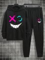 Extended Sizes Men's Plus Size Cartoon Smiling Face Printed Hoodie With Drawstring And Sweatpants Set