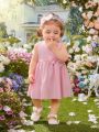 Baby Bow Front Flare Hem Dress