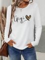 SHEIN LUNE Long-sleeve Tee With Text And Heart Print