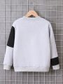 SHEIN Kids SPRTY Boys' Casual Colorblocked Round Neck Sweatshirt