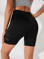 Yoga Trendy Mesh Insert Phone Pocket Sports Shorts